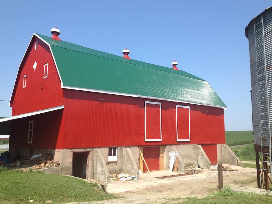 new paint on red and green barn